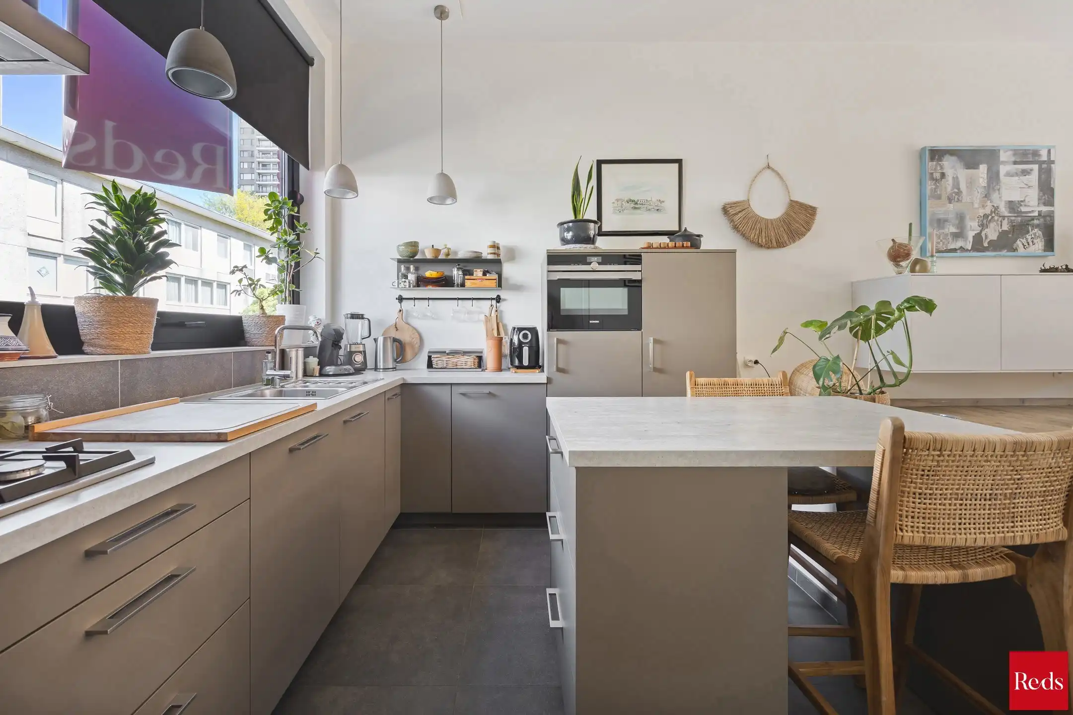 zeer verzorgde woning met 3 slaapkamers, groot terras en ondergrondse parkeerplaats foto 7
