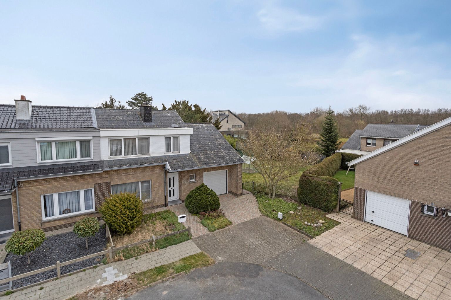 immo DAVID stelt voor: ruime en lichtrijke 3-gevelwoning  foto 2