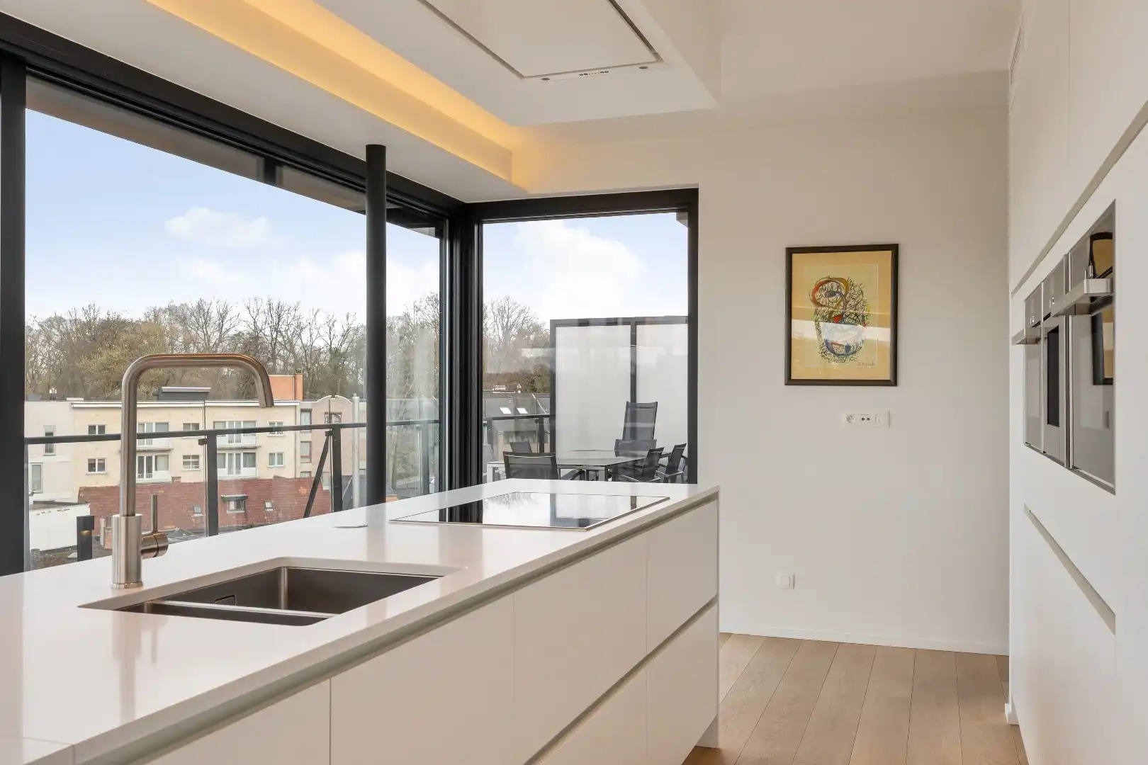 Exclusief penthouse met ruim terras, 2 slpk, dubbele autostaanplaats, centrum Genk foto 18
