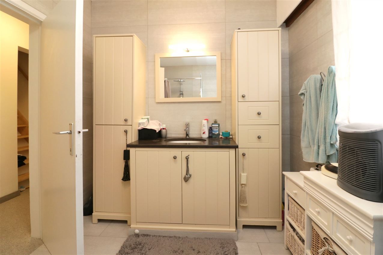 Gezellige woning, 4 slpk., inpandige garage, tuin foto 15