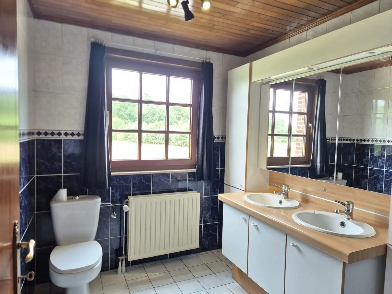 Open bebouwing met 3 slaapkamers, tuin en garage foto 10