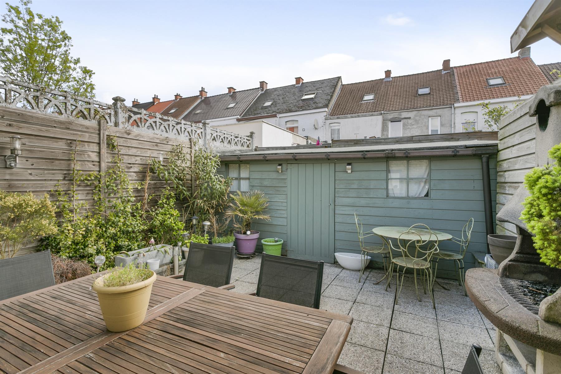 Instapklare rijwoning met garage en aangenaam terras! foto 14