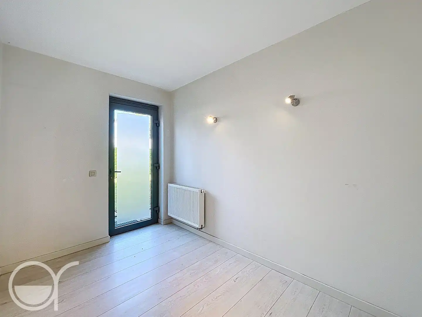 Ruim gelijkvloers appartement met twee slaapkamers, grote tuin én garagebox foto 11