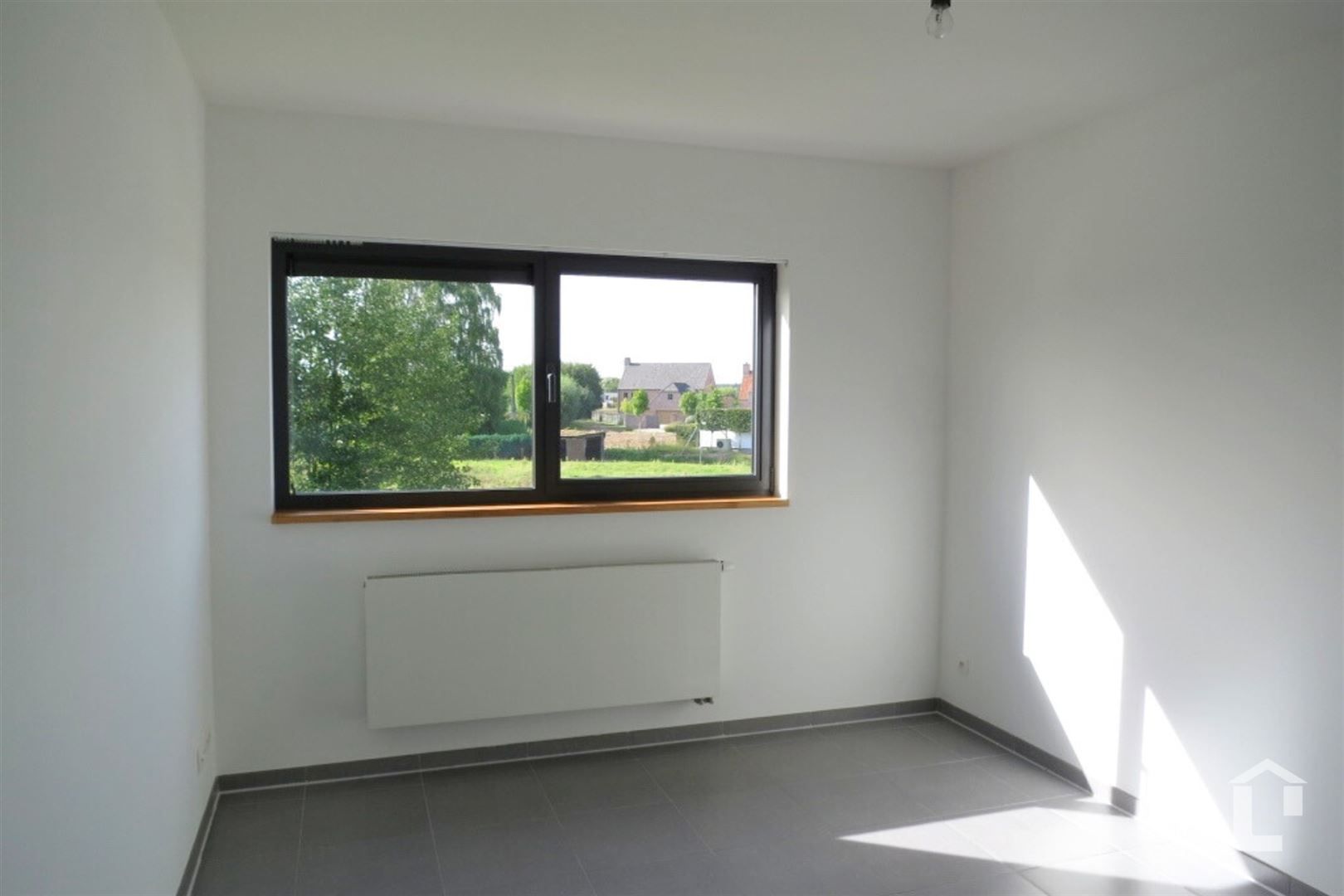 Lichtrijke moderne woning in rustige woonwijk te Eke foto 8