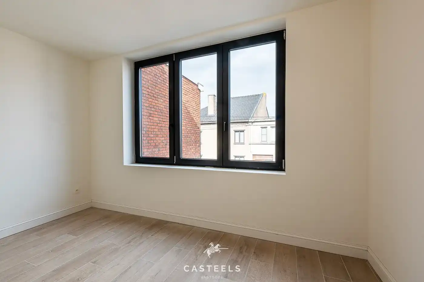 Ruime duplex met zonnig terras te Zelzate te koop foto 18