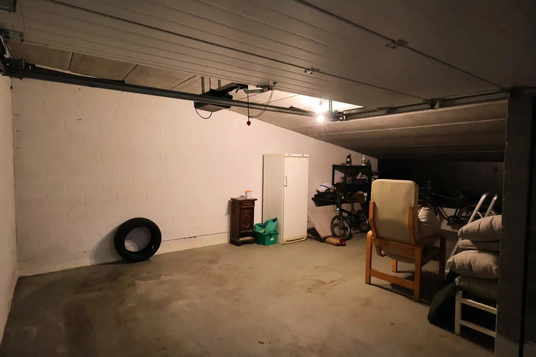 Een garagebox in de kelderverdieping, G27 in het centrum van Hoogstraten foto 4