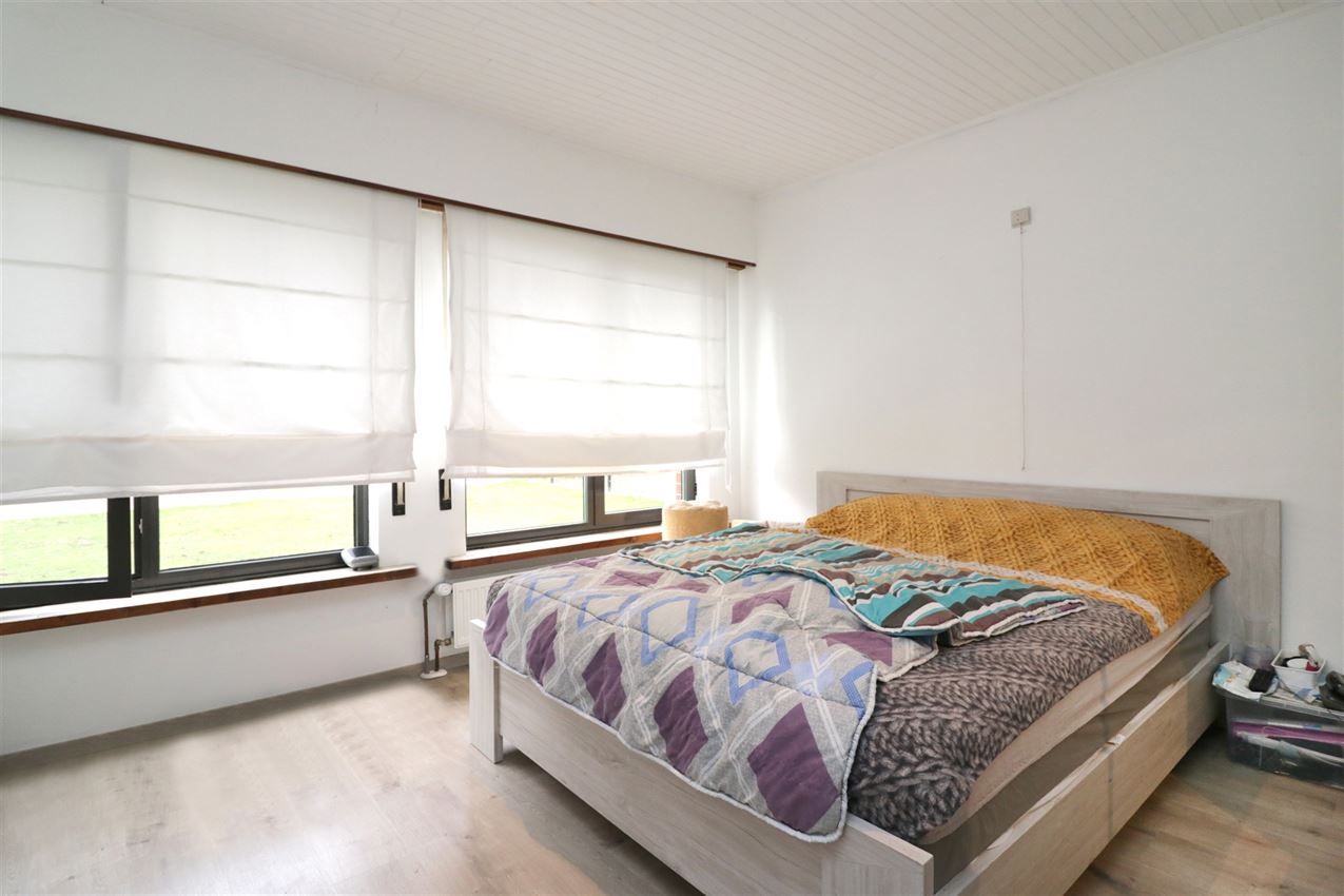 Gezellige woning, 4 slpk., inpandige garage, tuin foto 16