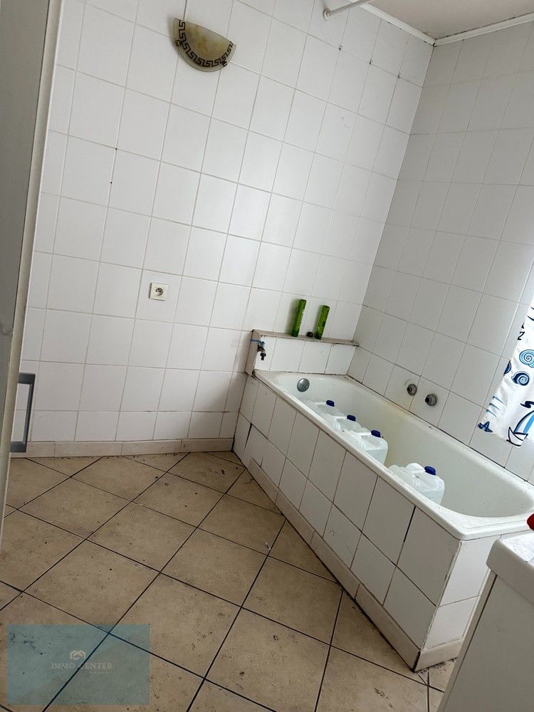 Te koop – Te renoveren halfopen woning met 3 slaapkamers en tuin in Zwartberg (Genk) foto 6