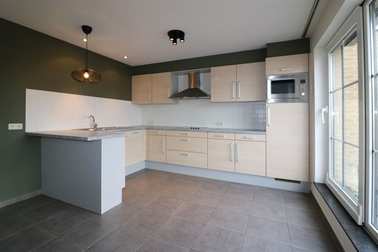 Duplex met groot terras, twee slpk en afgesloten garage foto 9