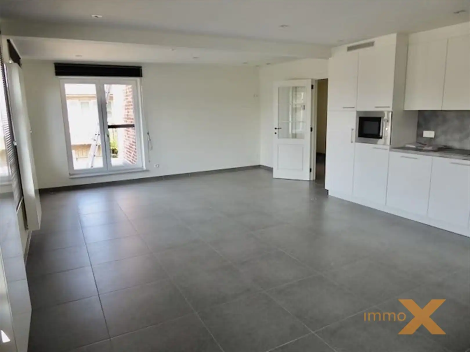 Heel ruim gerenoveerd appartement met leuk terras foto 19