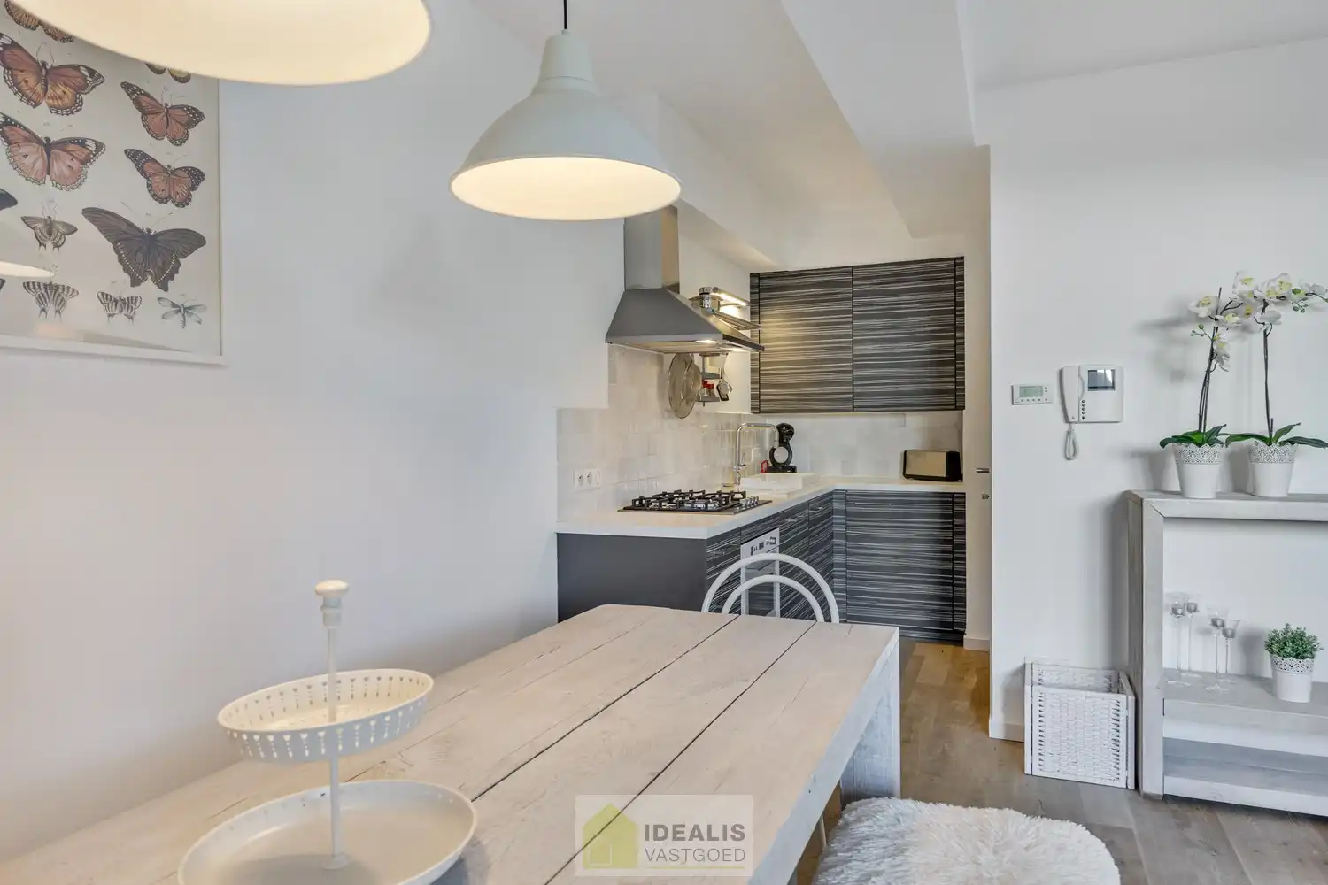 IDEALIS VASTGOED - HEERLIJK GELIJKVLOERS VAKANTIE-APPARTEMENT TE ZEEBRUGGE-BAD OP WANDELAFSTAND VAN HET STRAND EN DE DUINEN! EEN FIJNE PLEK BESTAANDE UIT EEN LICHTRIJKE LEEFRUIMTE MET OPEN KEUKEN EN BERGING, 1 RUIME SLAAPKAMER, 1 INPANDIGE KINDERKAMER, EEN EXTRA RUIM TERRAS EN EEN GOED TOEGANKELIJKE ONDERGRONDSE PARKEERPLAATS (AUTOLIFT) EN KELDERBERGING! foto 15