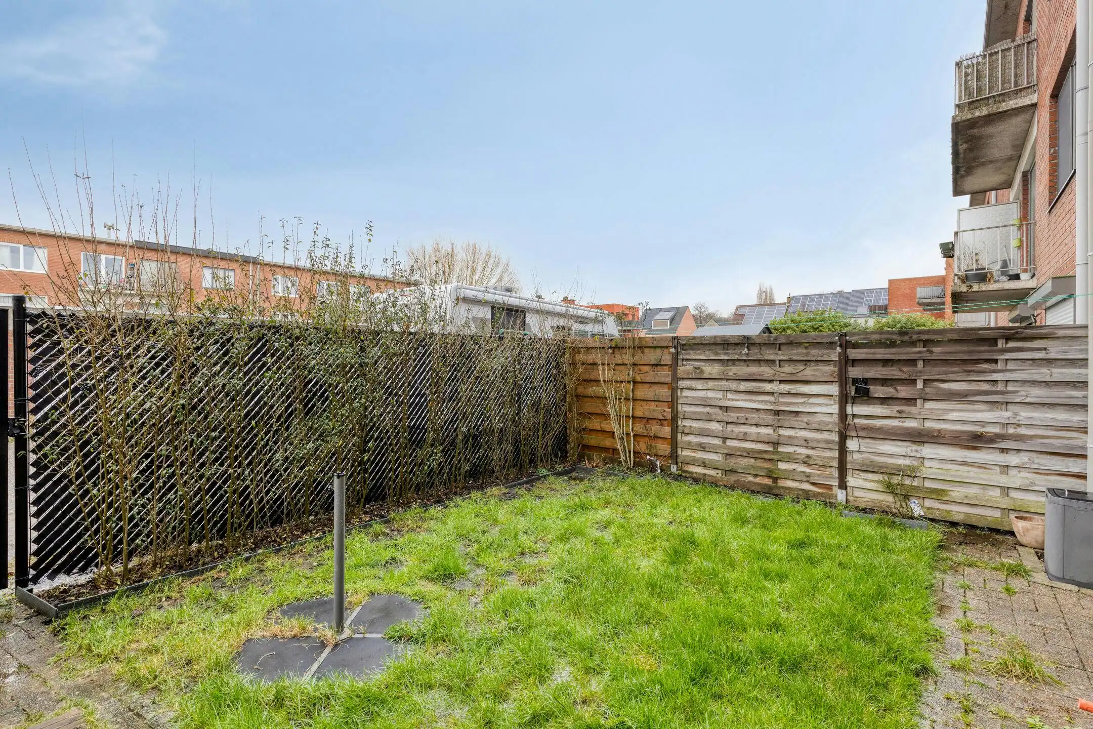 Gelijkvloers appartement met ZW-tuin en garage te koop foto 12