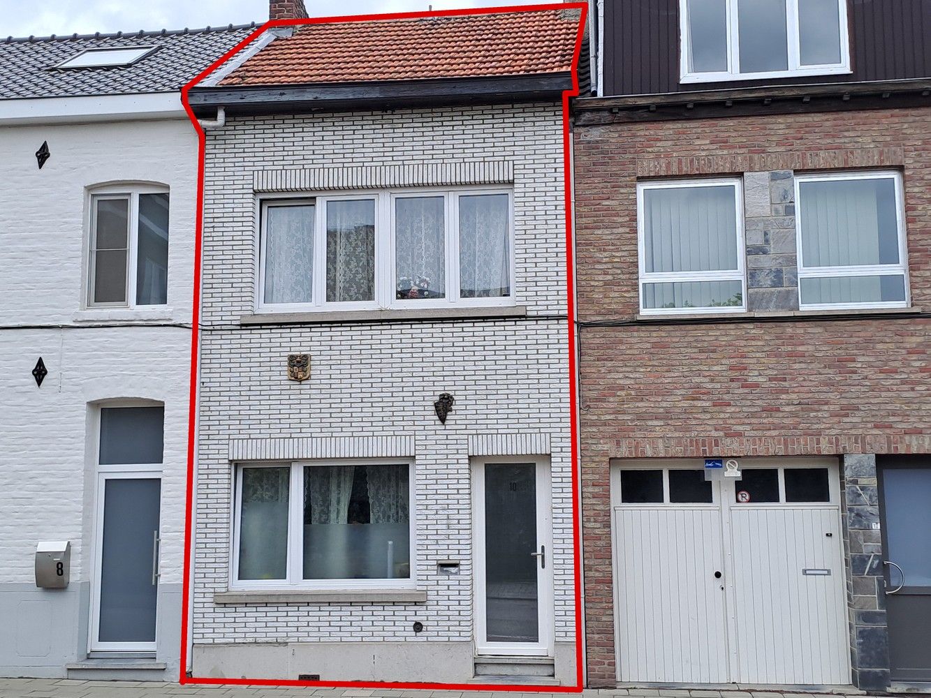 rijwoning gelegen aan de stadsrand van Sint-Truiden foto {{pictureIndex}}