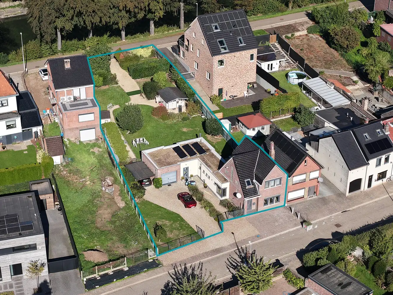 INSTAPKLAAR GERENOVEERDE WONING MET 3 SLAAPKAMERS, GARAGE, CARPORT EN PRACHTIGE TUIN NABIJ HET KANAAL EN DE MAAS IN LANAKEN foto 44