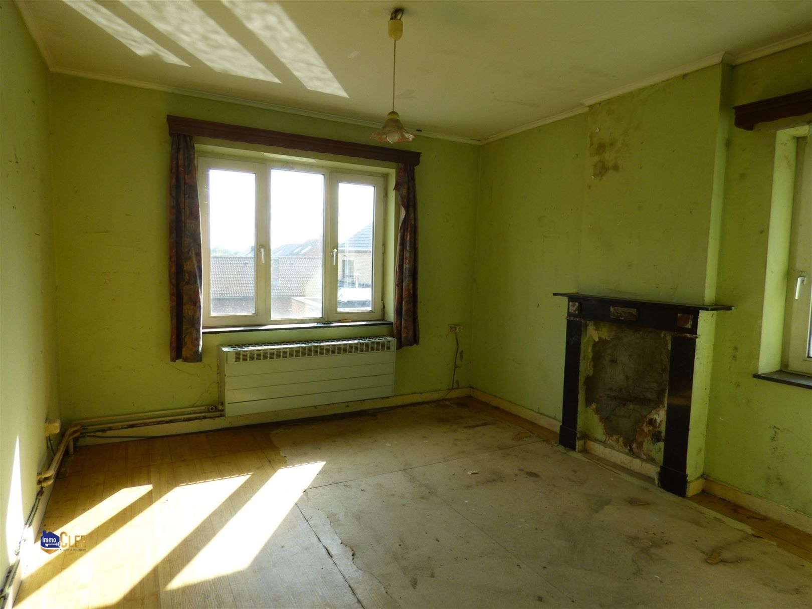 Te renoveren woning met 3 slaapkamers en garage foto 8