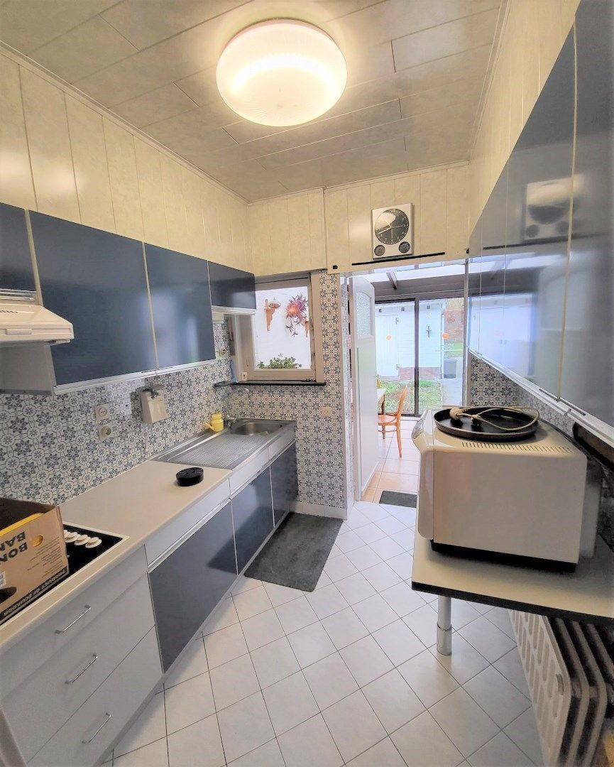 Halfopen bebouwing met garage en schitterende tuin. foto 10