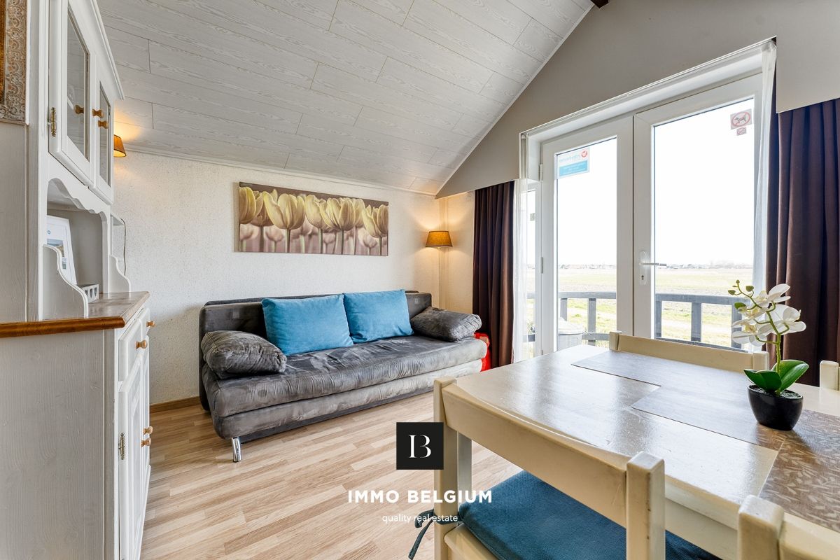 Gemeubeld vakantie appartement met zicht over de polders foto 6