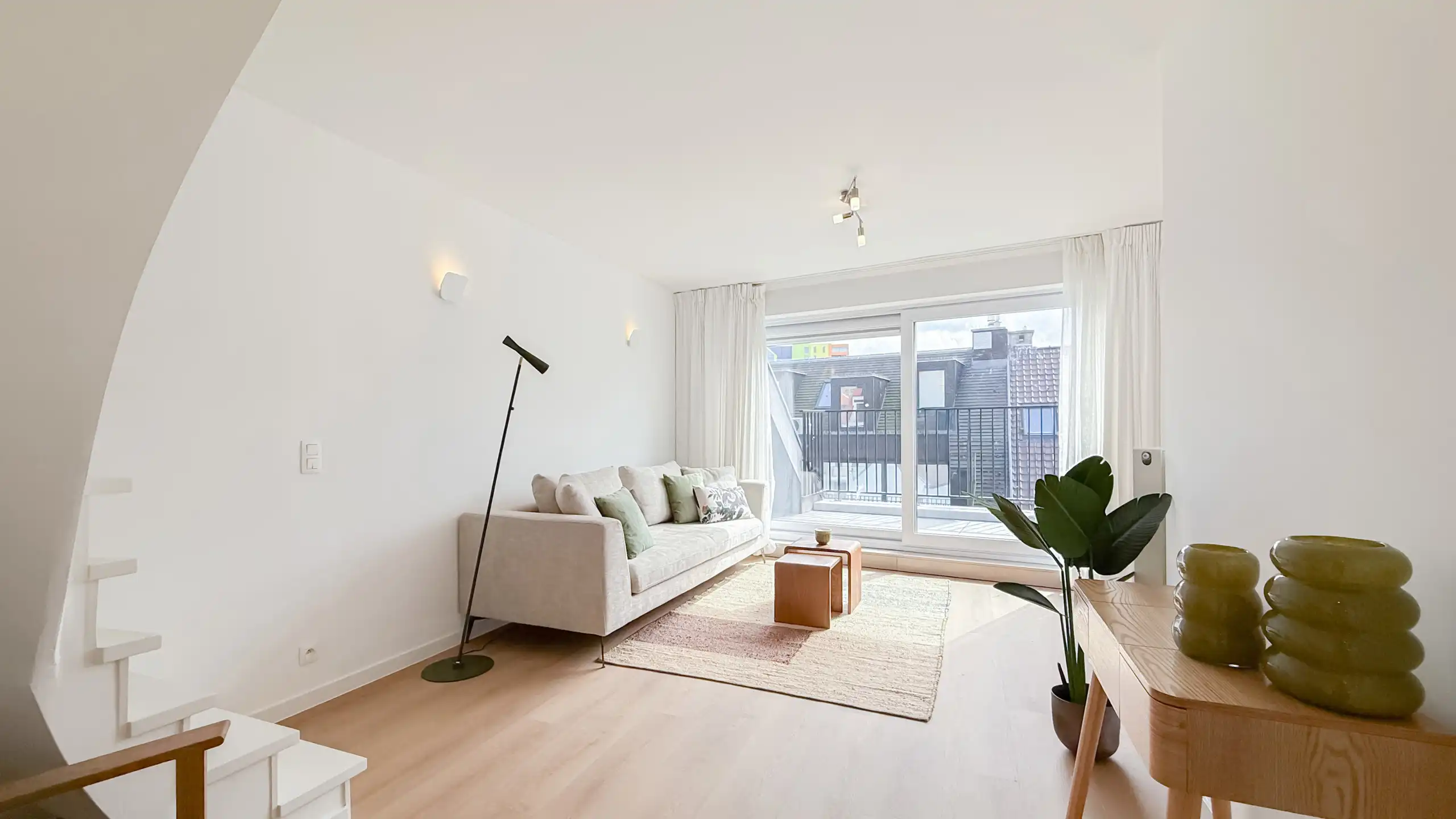Licht en modern duplexappartement met zuidgericht terras... foto {{pictureIndex}}