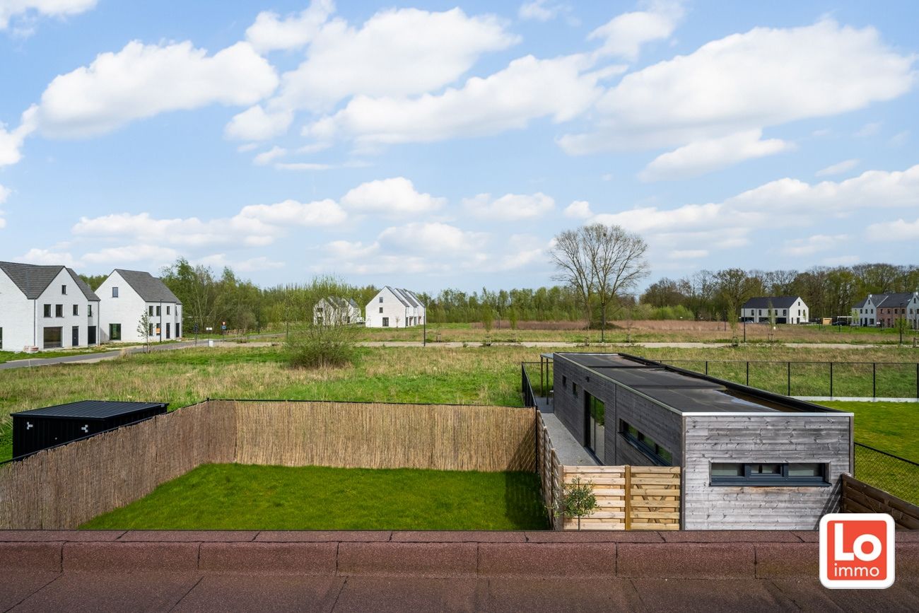 Instapklare recente woning met carport en bijgebouw op een rustige en toch heel centrale locatie op de grens Oostakker, Destelbergen en Lochristi. foto 12