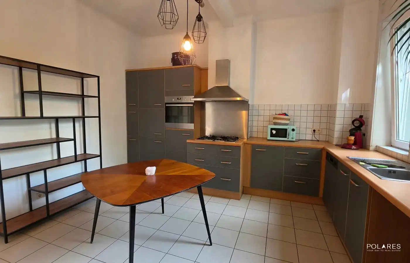 Gelijkvloers appartement met prachtige tuin én polyvalent bijgebouw! foto 4