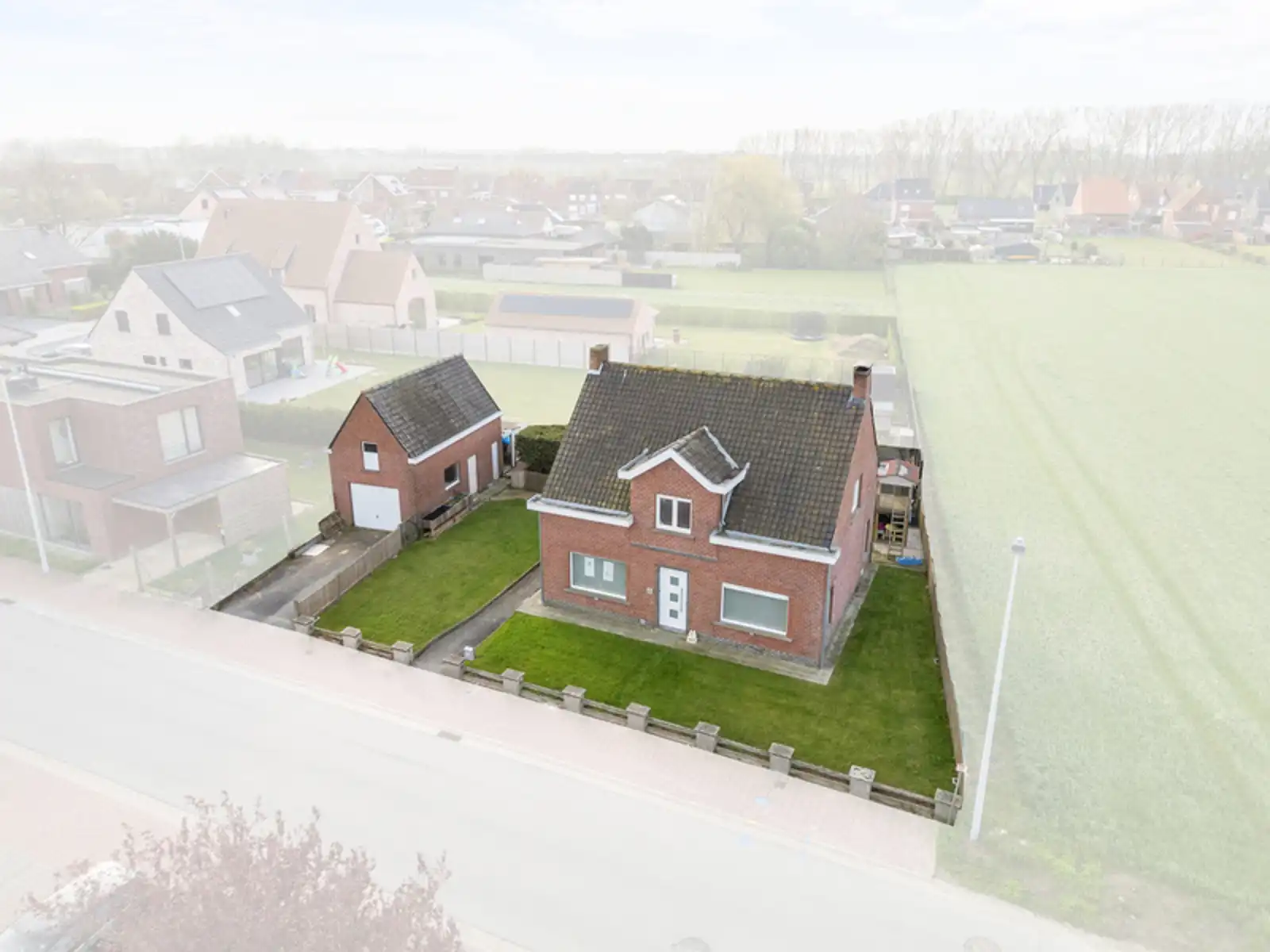 Hoofdfoto van de publicatie: Rustig gelegen alleenstaande woning met tuin en garage.