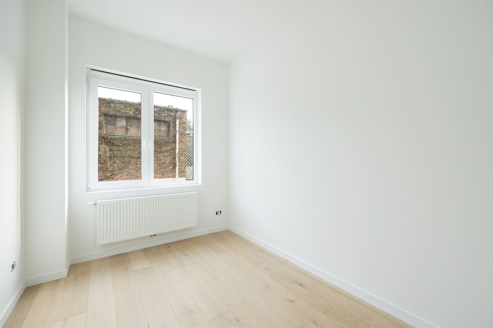 Ruim en licht 2-slaapkamerappartement met dakterras foto 22