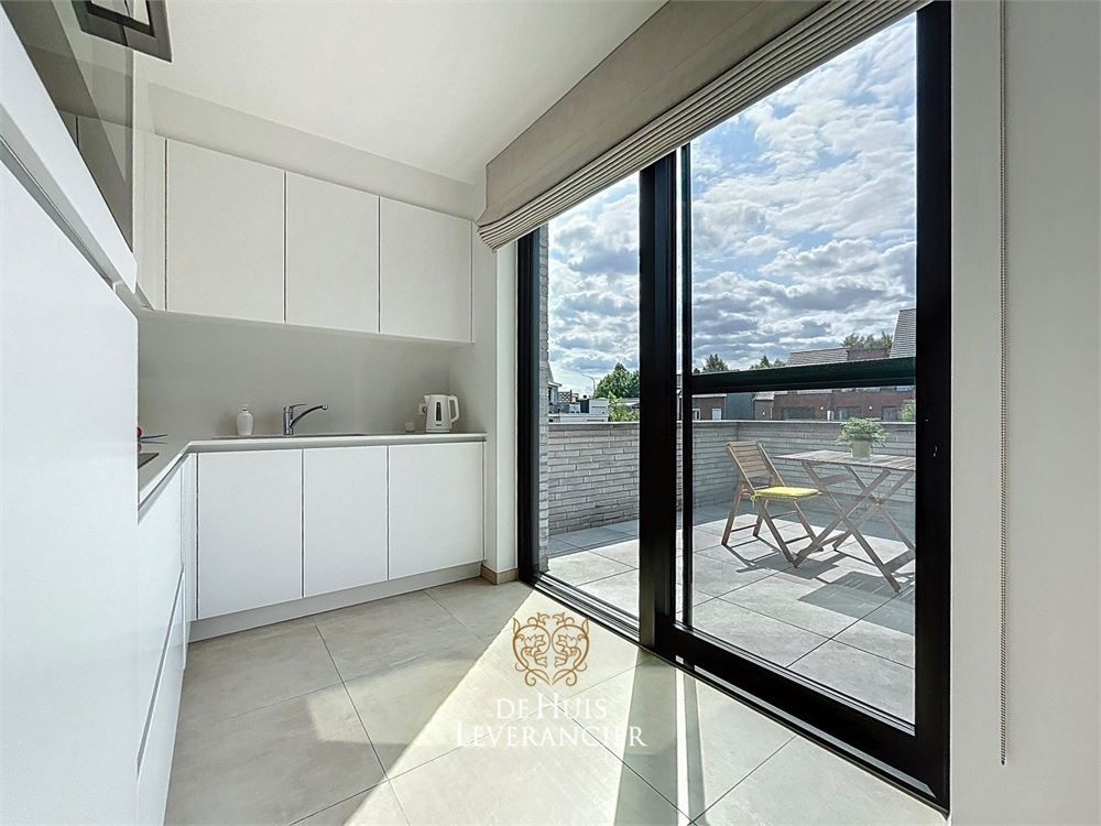 Discrete luxe & tijdloze elegantie : subliem nieuwbouwappartement met terras en gemeenschappelijk tuin te koop in Boechout foto 24