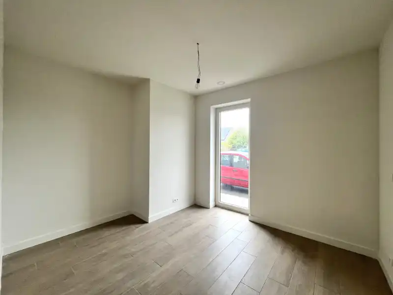 Energiezuinig 2 slpkm appartement met terras, tuin en staanplaats foto 13