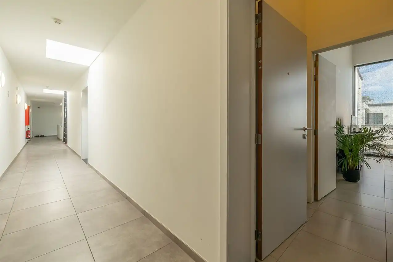 Ruime, zonnige penthouse met 2 slpk. en 2 ondergrondse autostaanplaatsen foto 22