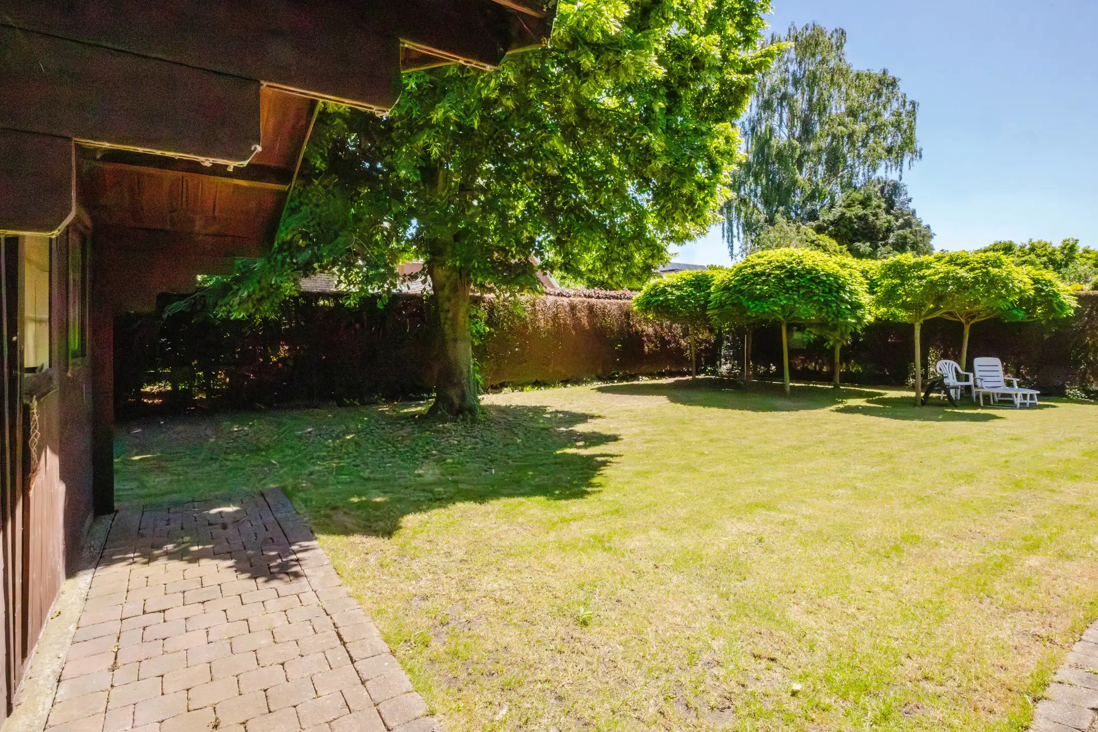 Rustig gelegen woning met 4 slaapkamers en tuin te Drongen  foto 2