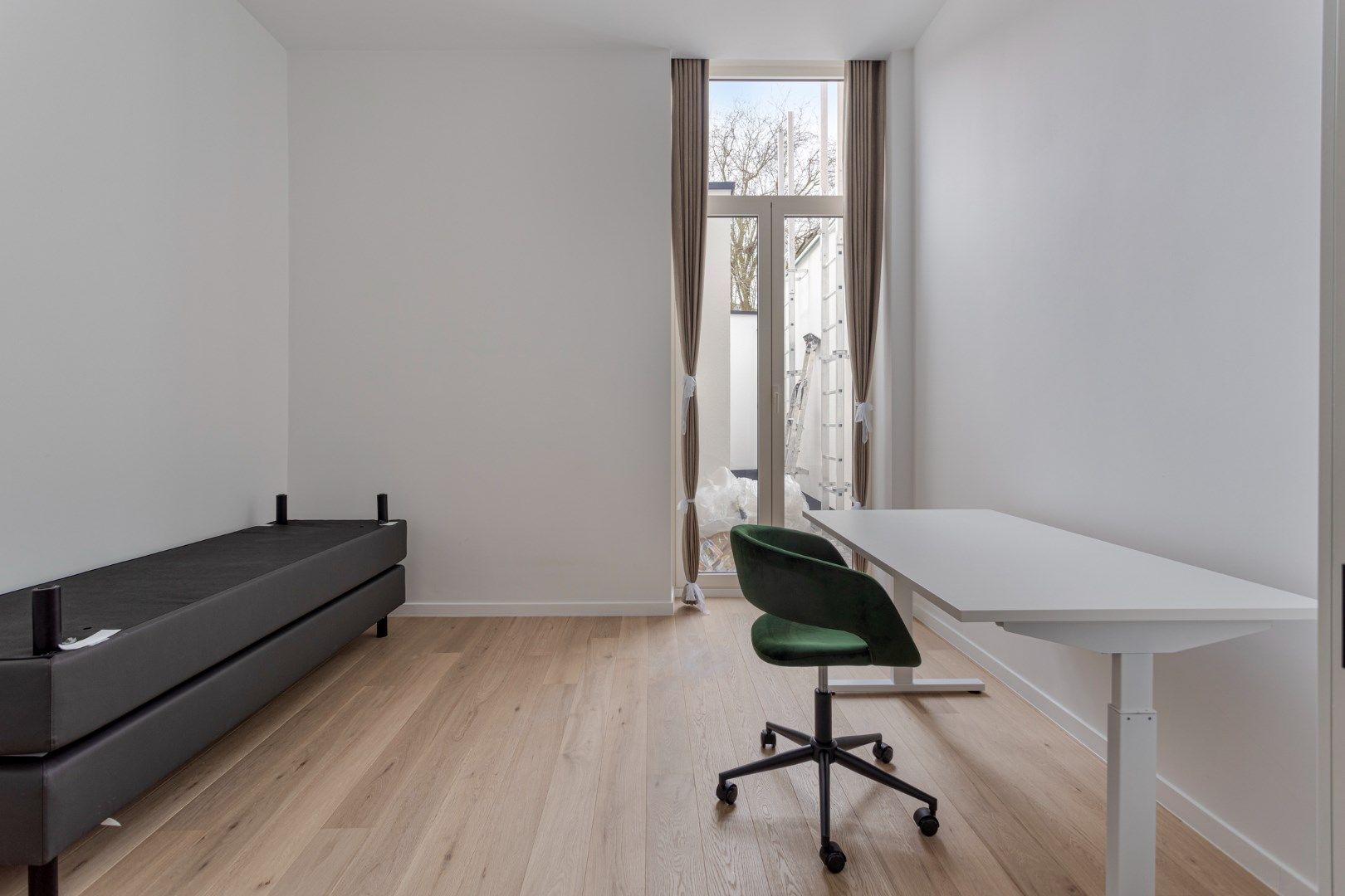 Volledig gerenoveerde studentenkamer in residentie met 29 studentenkamers met eigen sanitair in hartje Leuven  foto 11