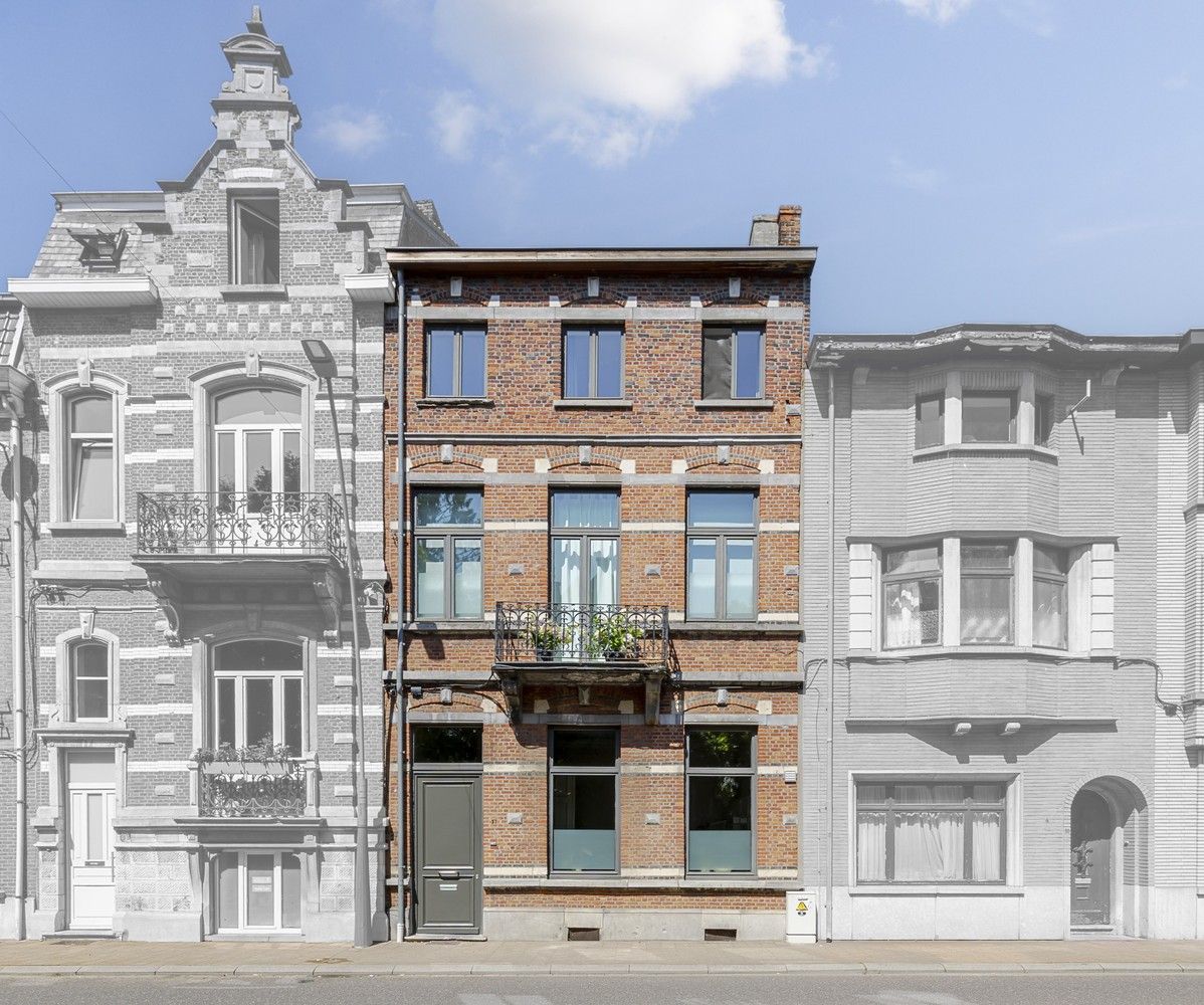 Statige herenwoning in hartje Aarschot – instapklaar en vol karakter foto {{pictureIndex}}