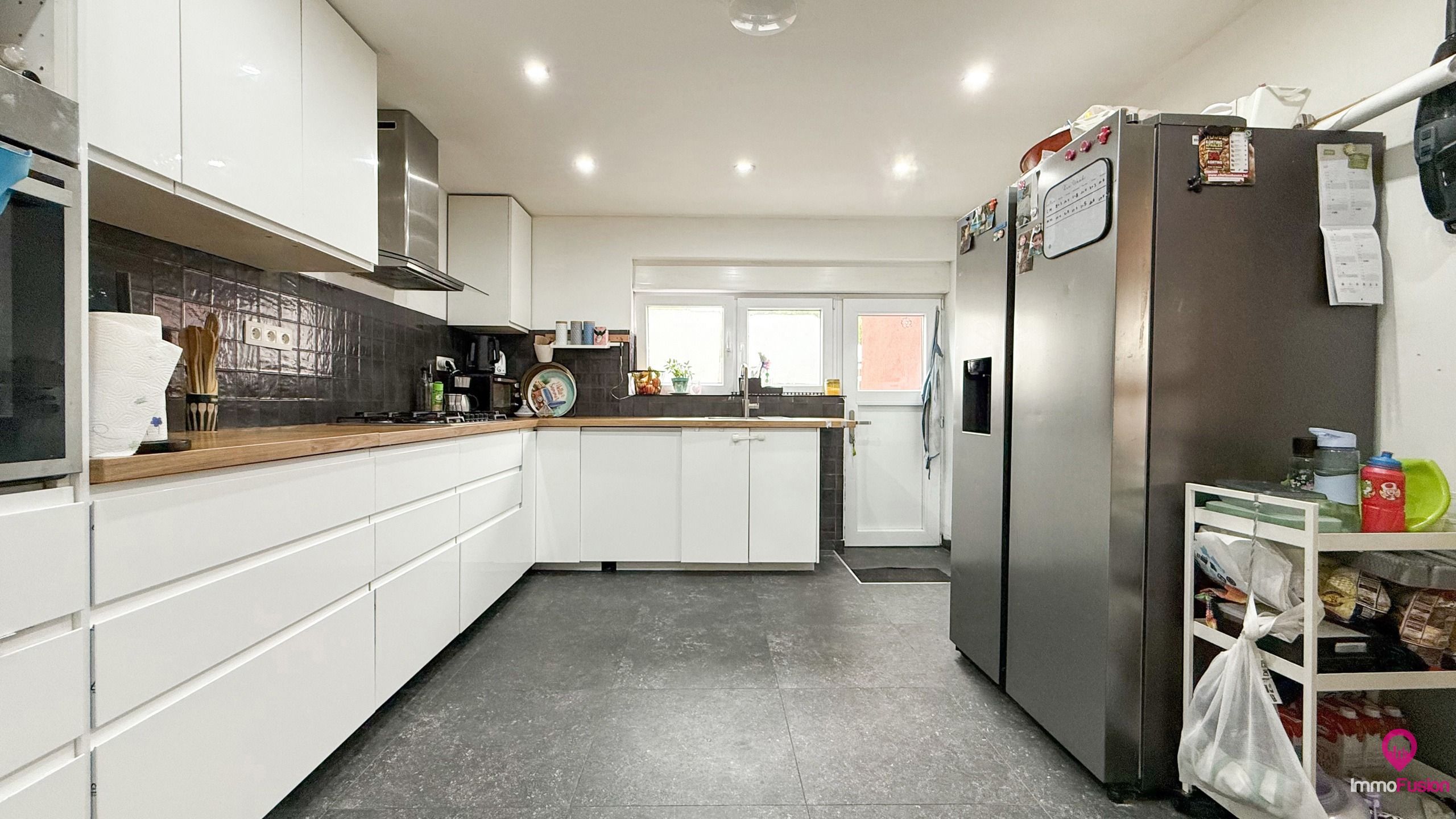 Woning met handelsruimte en 203 m² woonopp. te Houthalen! foto 9