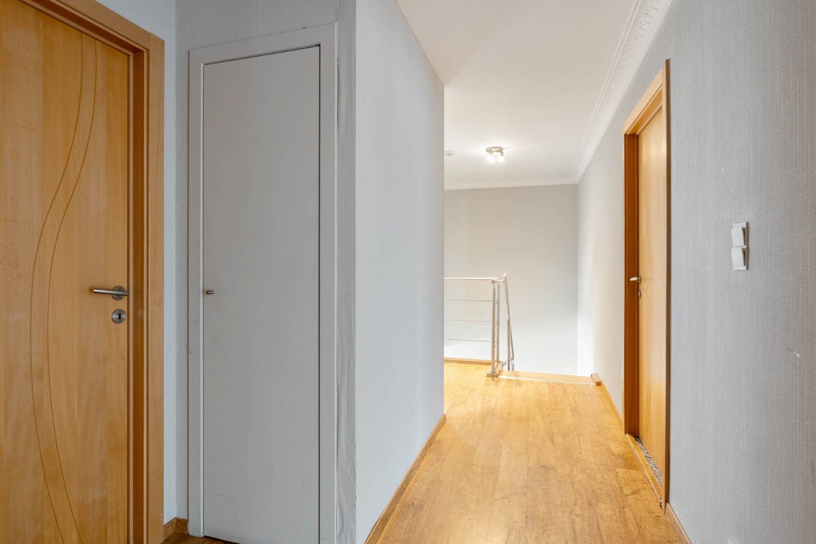 Multifunctioneel gebouw bestaande uit een woning, een winkel en een magazijn/werkplaats gelegen op een rustige locatie te Voorshoven! foto 11