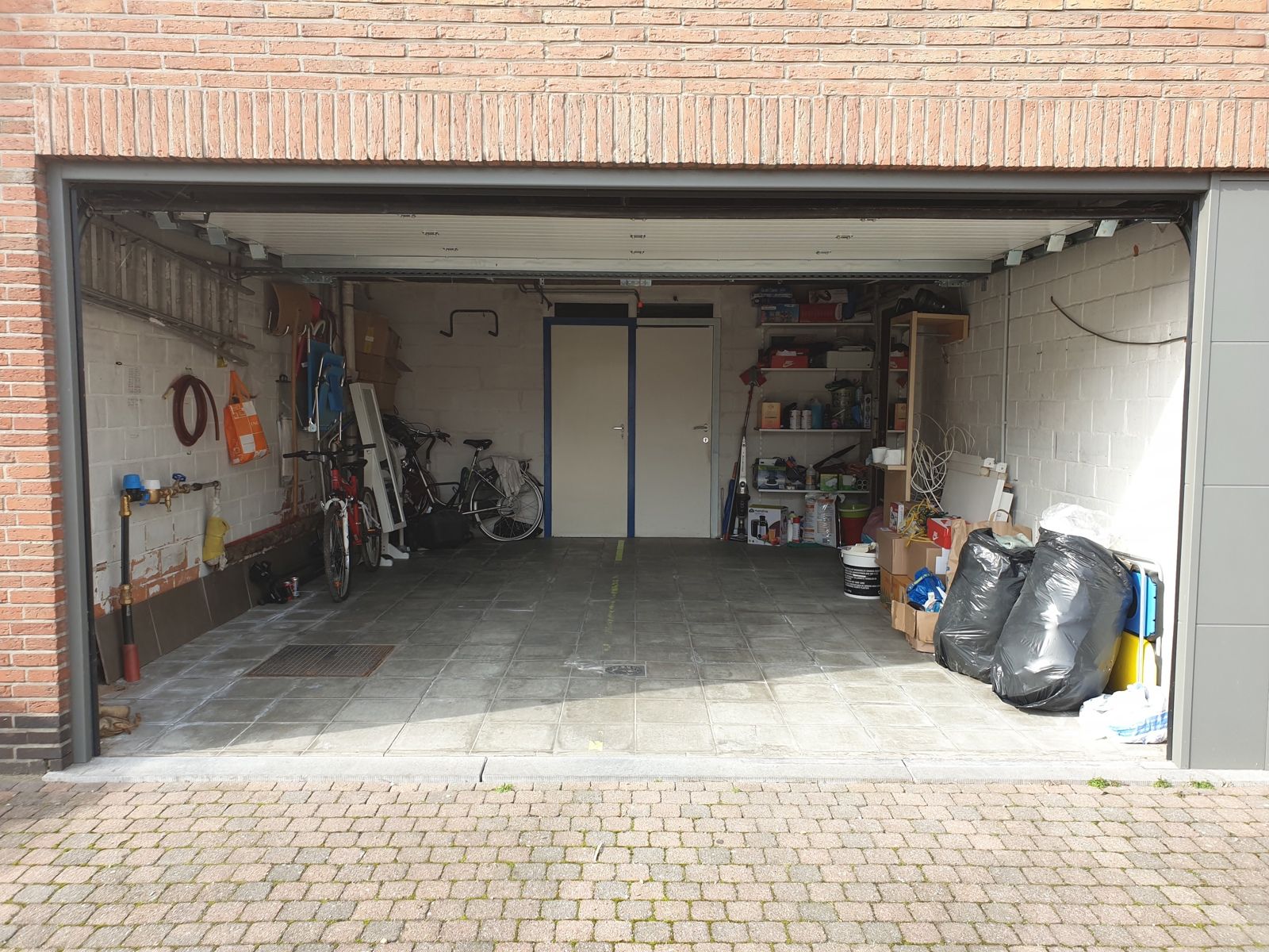 Woonhuis met 2 appartementen, tuin en garage foto 3