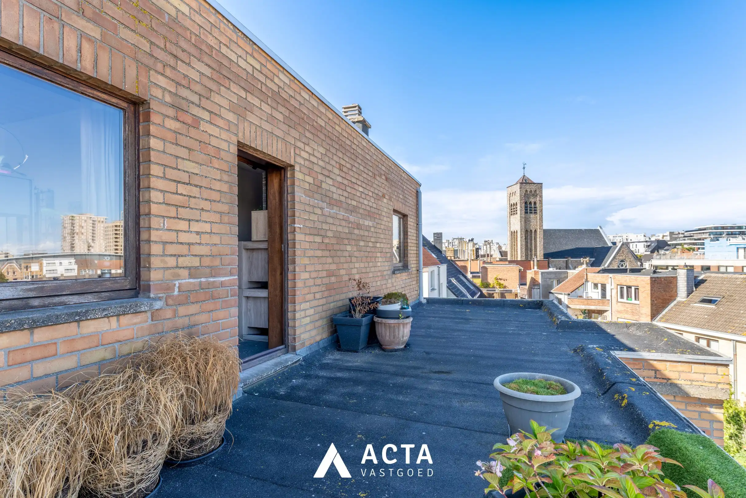 Dakappartement met zonnige terrassen in Mariakerke foto 15