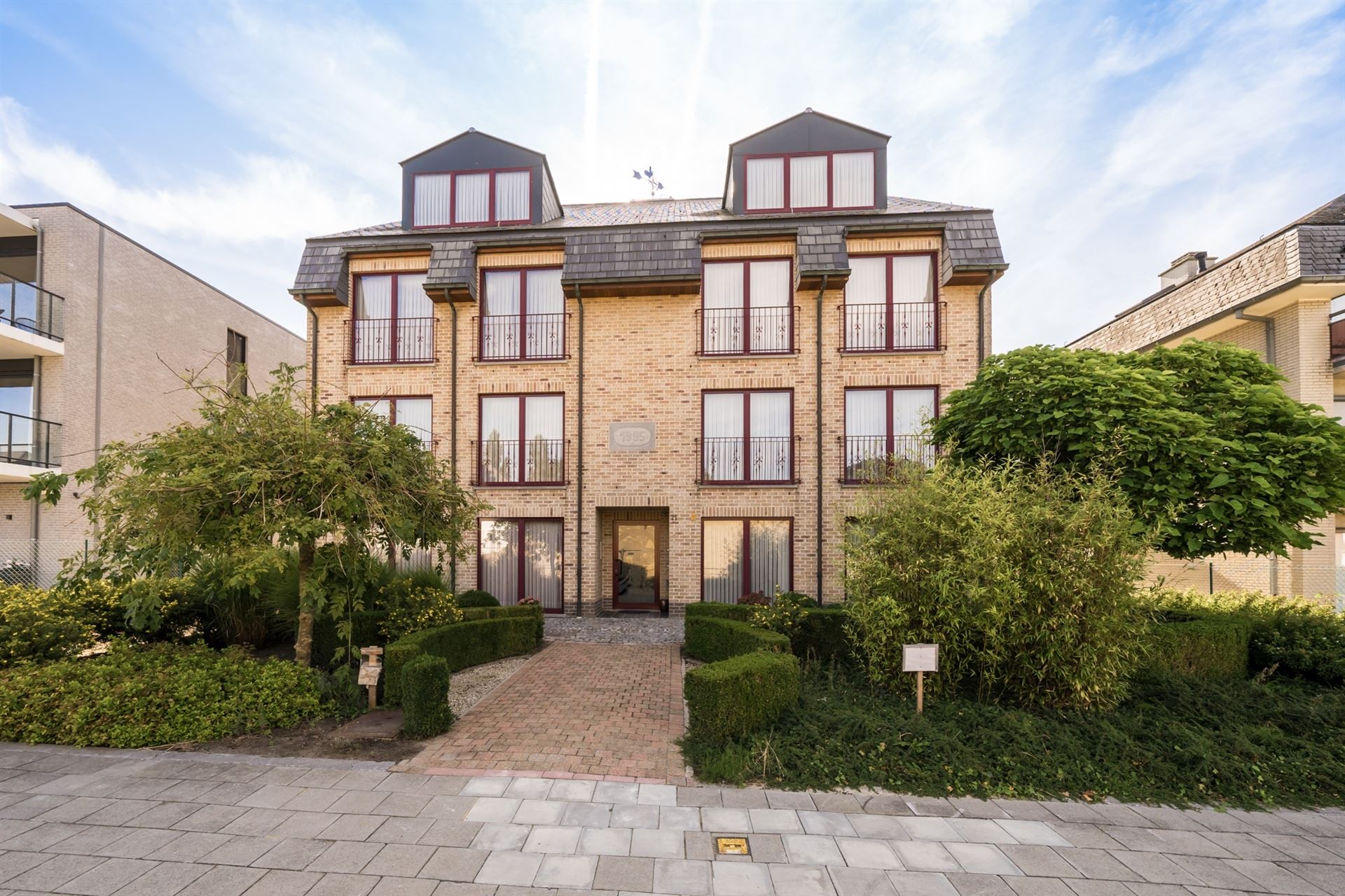 Duplex appartement met 2 slaapkamers, zonnig terras en garagebox foto 1