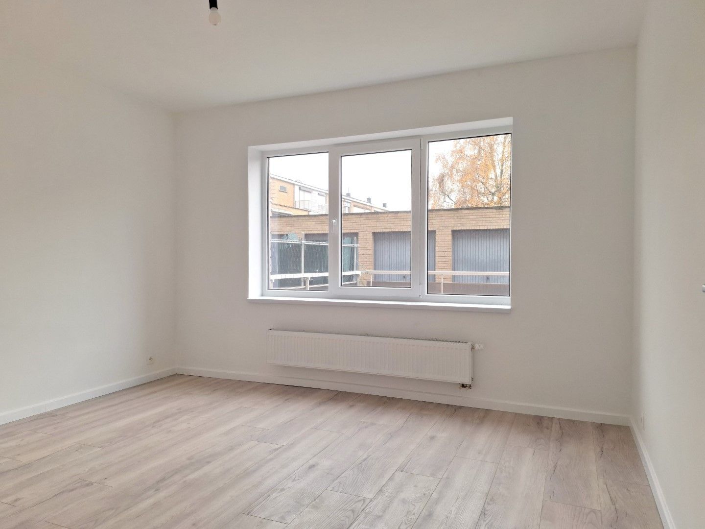 Instapklaar gelijkvloers appartement met 2 slaapkamers, terras en ondergrondse staanplaats foto 3