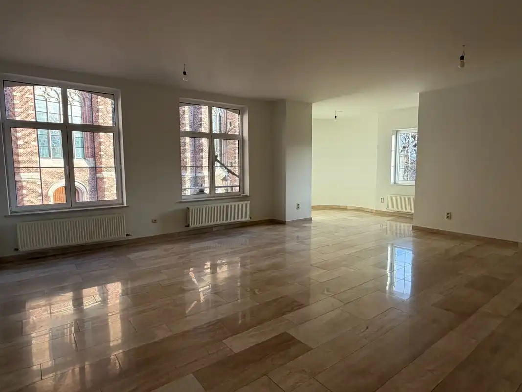 Instapklaar triplexappartement met 3 slaapkamers, 2 badkamers, garage + P in hartje Hoogstraten. foto 8