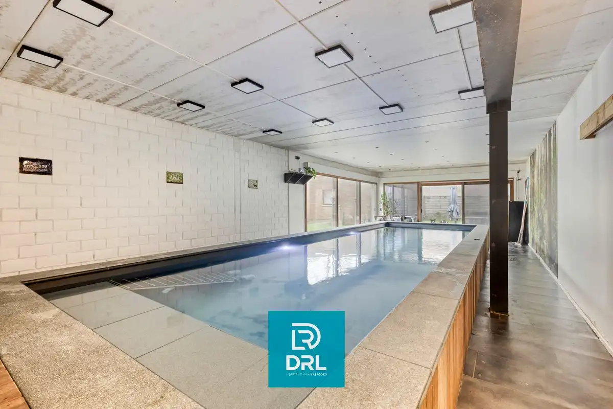Uniek handelshuis met instapklare woning en binnenzwembad foto 11