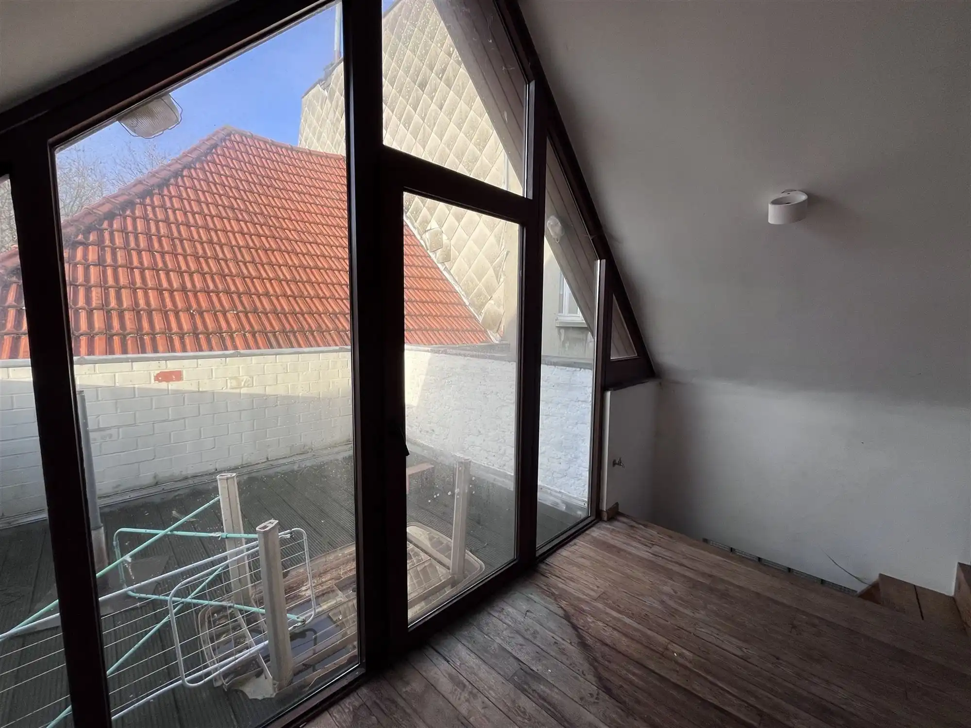 Op te frissen stadswoning met loftgevoel en dakterras foto 7