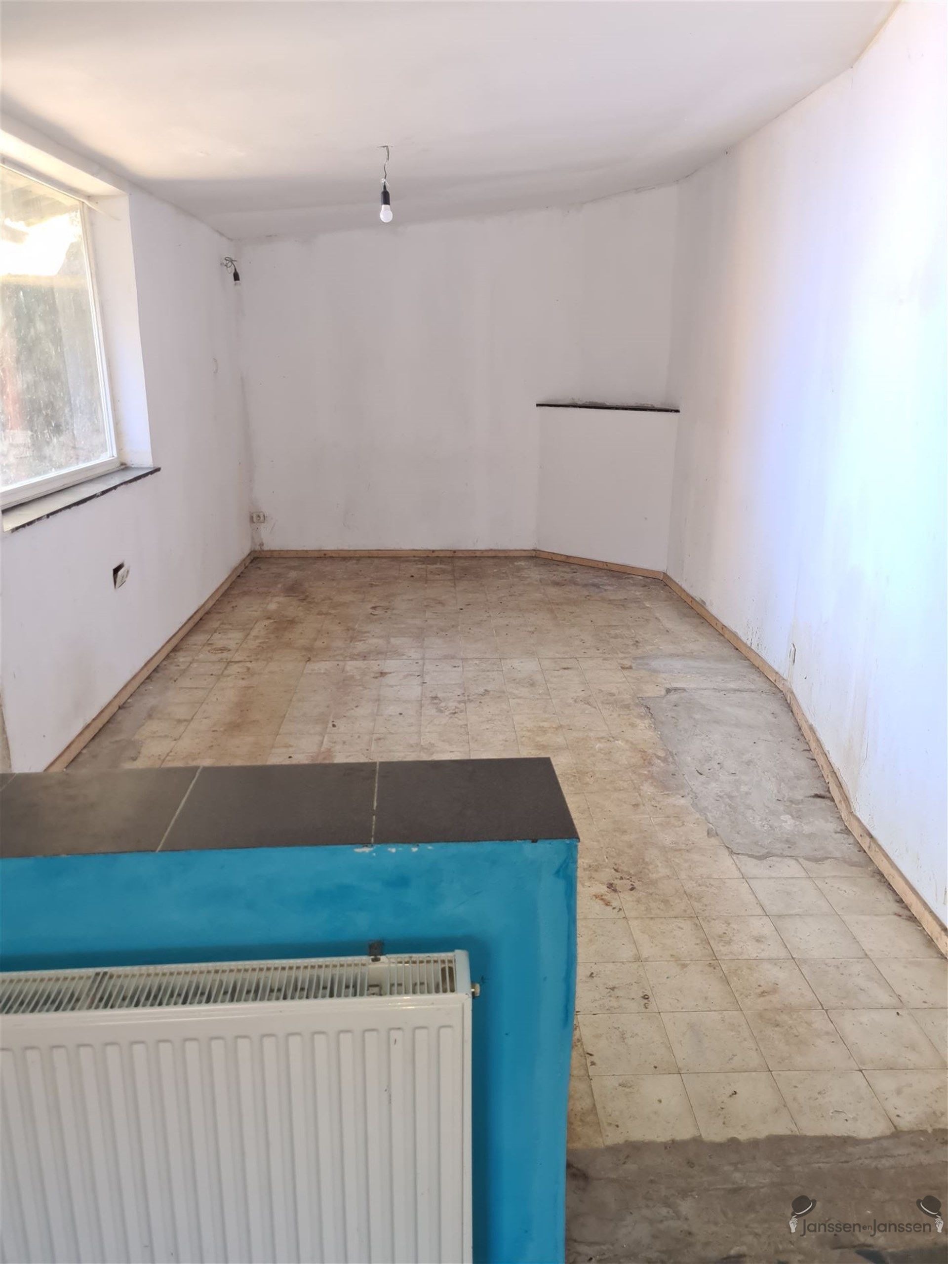 Op te knappen woning met veel potentieel in Tongeren foto 5