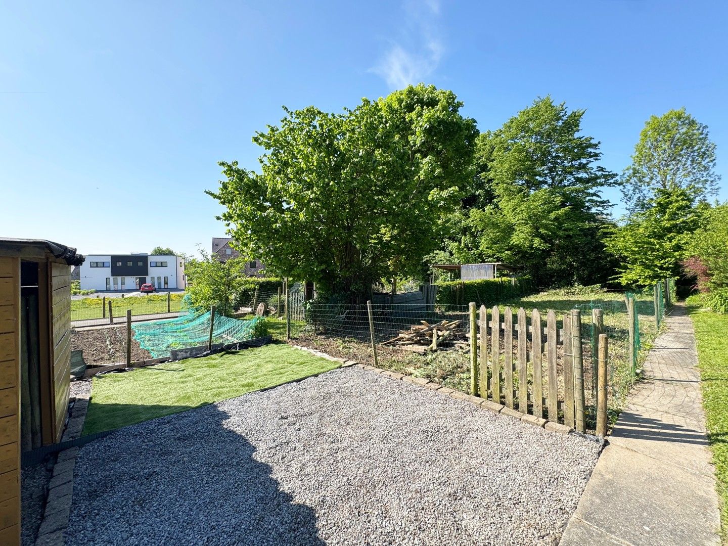 Opbrengsteigendom met potentieel in hartje Borgloon – Tweewoonst met tuin en terras foto 12