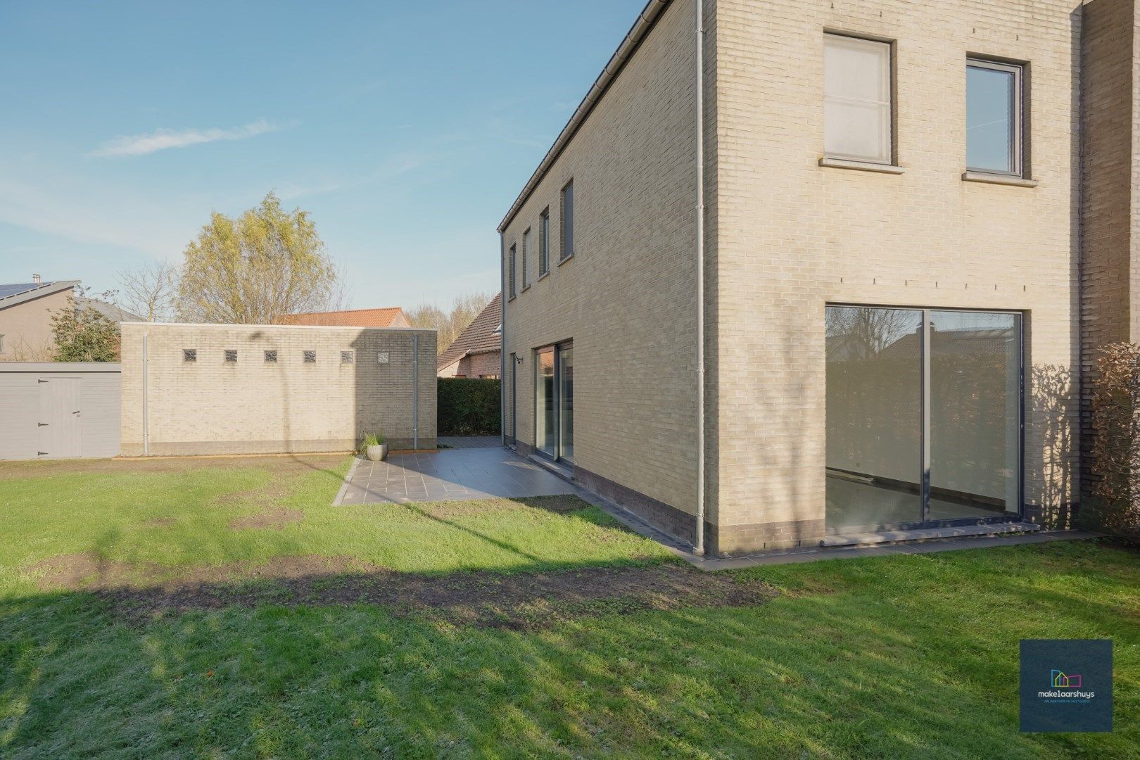 Ruime half-open bebouwing te Heusden met garage en tuin foto 19