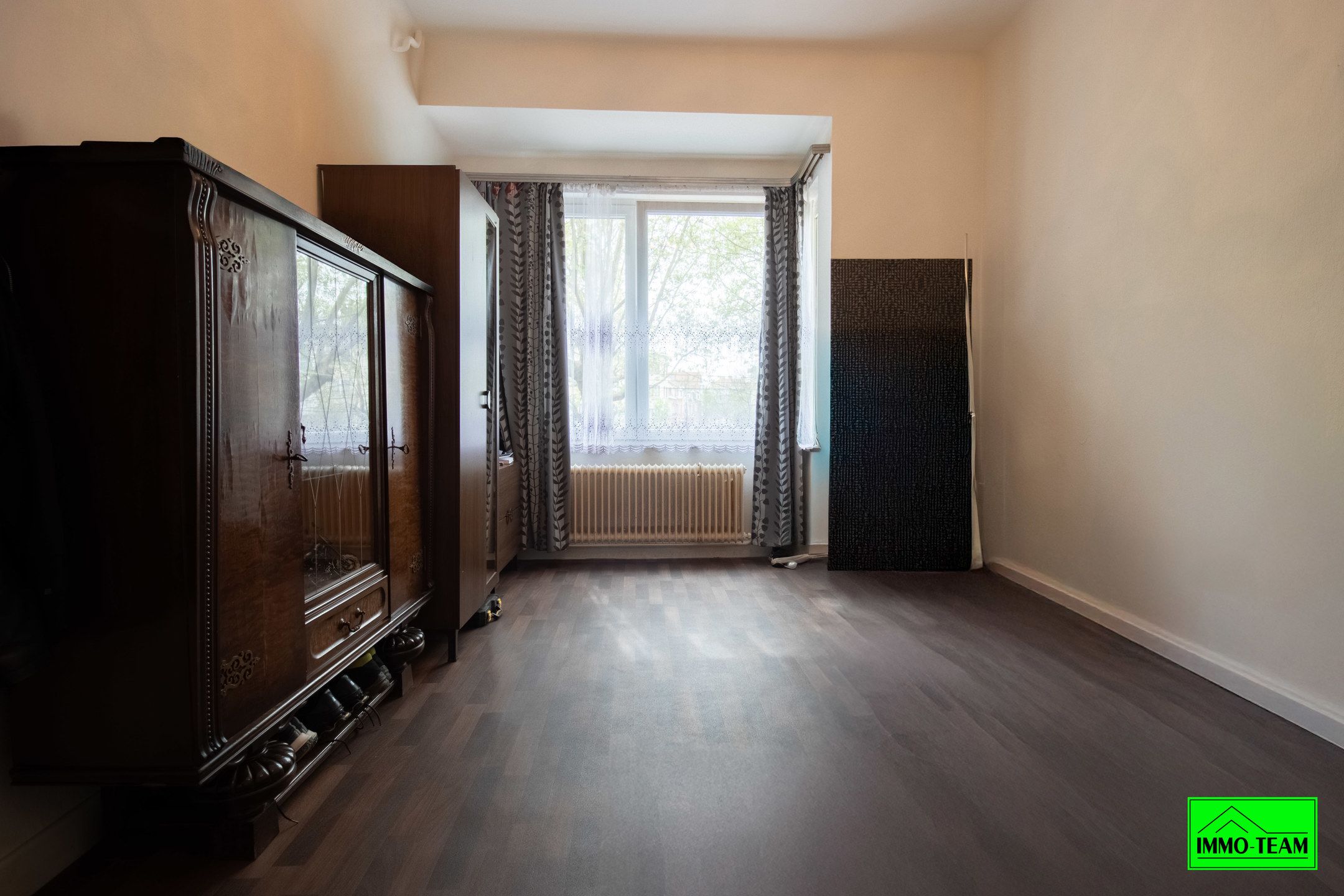 Opbrengsteigendom met 2 appartementen en autostaanplaatsen foto 9