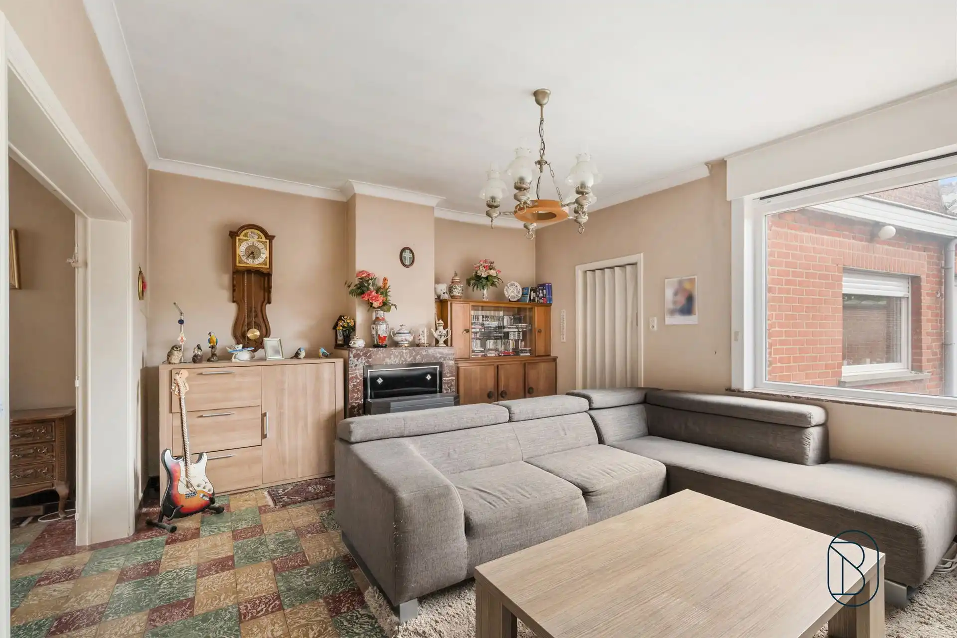 Te renoveren gezinswoning met 3 slaapkamers en grote tuin! foto 5