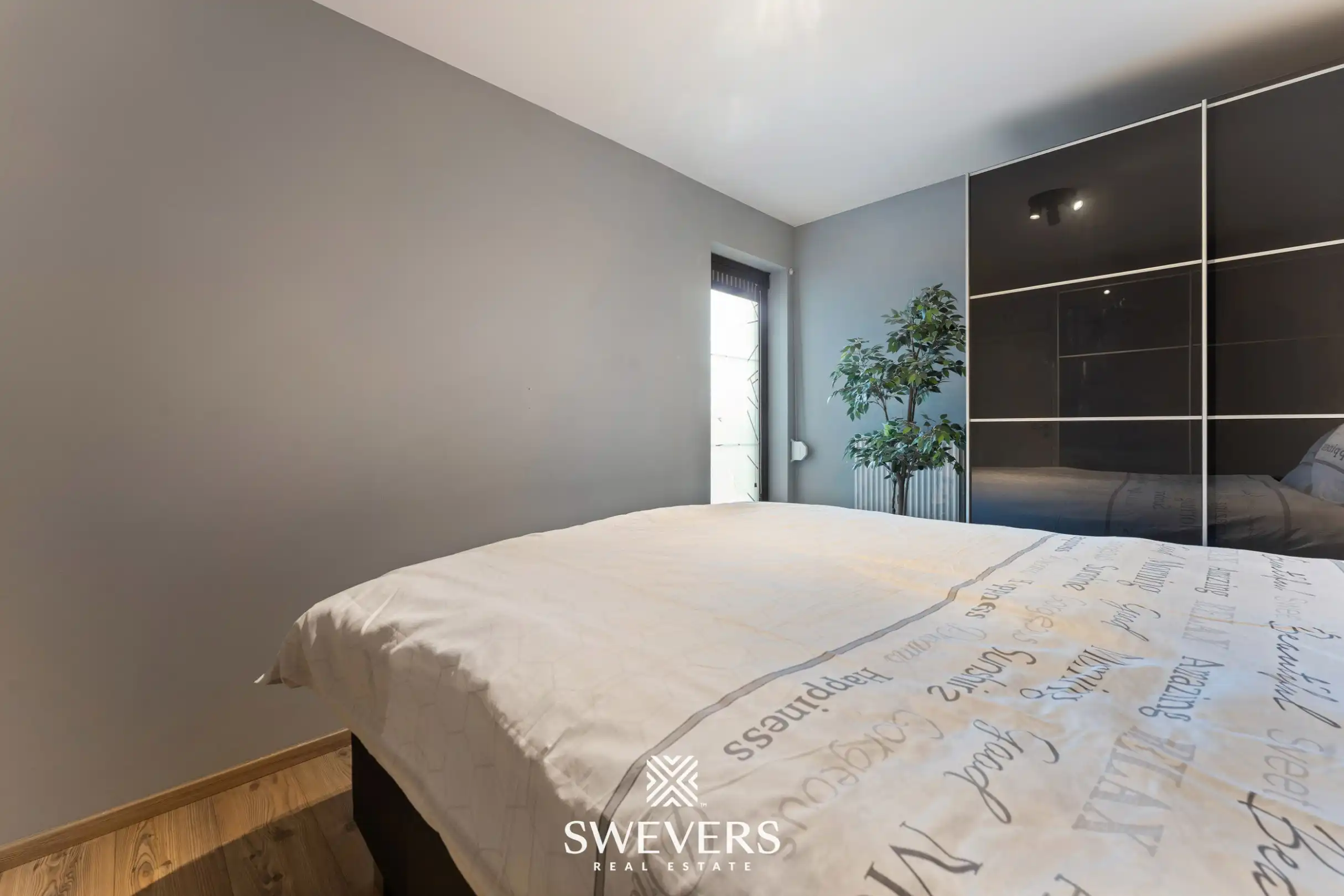 Ruim instapklaar appartement met 3 slaapkamers, zonnig terras en ondergrondse parking te Genk (EPC: A) foto 11