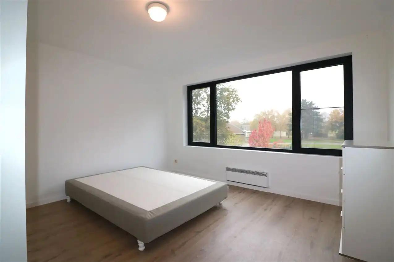 Appartement met 2 slpk, terras, tuin en autostaanplaats foto 13