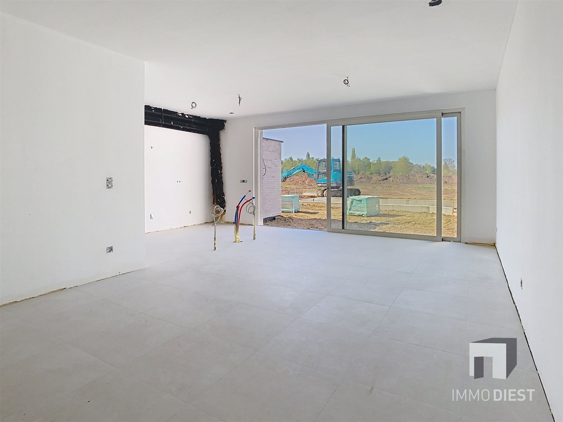 Gelijkvloers appartement met terras en tuintje foto 5
