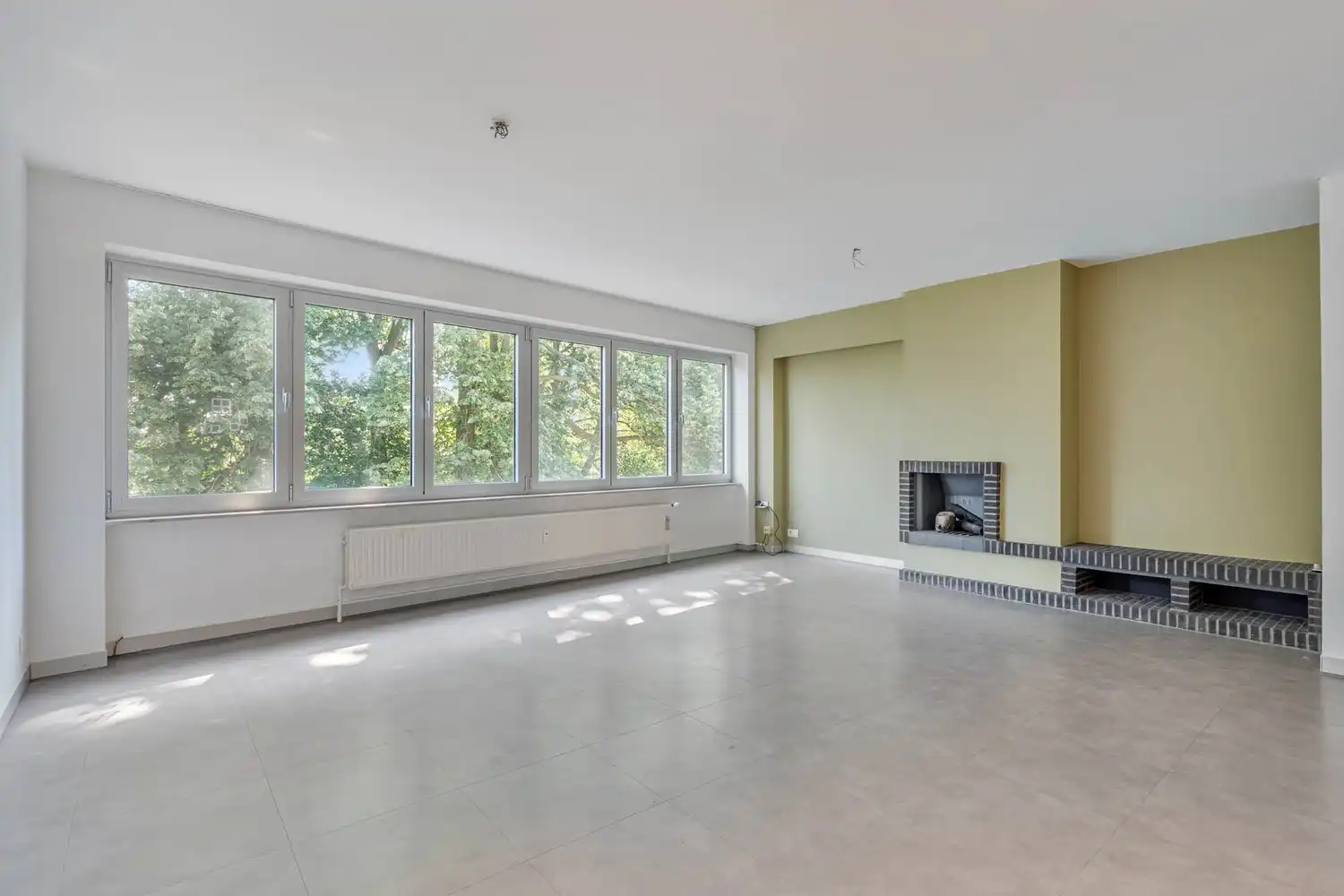 Goed gelegen, lichtrijk en energiezuinig appartement met 2 slaapkamers, een terras en een gemeenschappelijke tuin tegenover de botanische tuin en nabij het UZ Gasthuisberg te centrum Leuven! foto 9